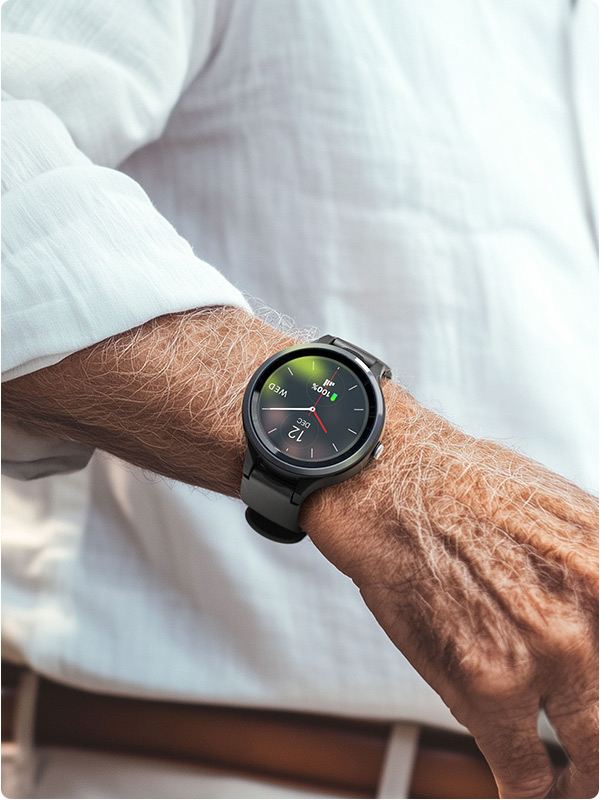 Elderly man wearing a Live Life mobile fall detection watch