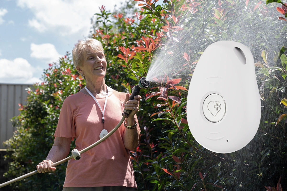 Senior woman wearing LiveLife pendant while talking
