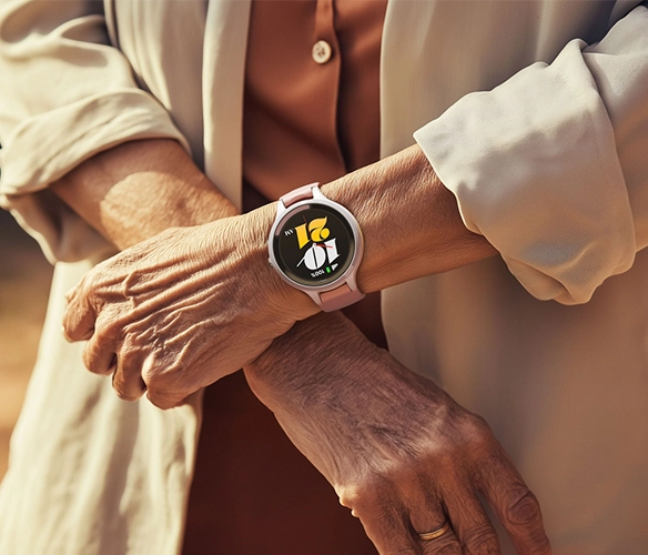 Elderly couple enjoying life with LiveLife personal alarm watch