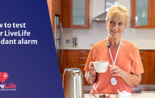 Senior lady in the kitchen, having a cup of tea and smiling.