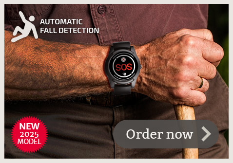 Elderly man wearing automatic fall detection watch by live life alarms