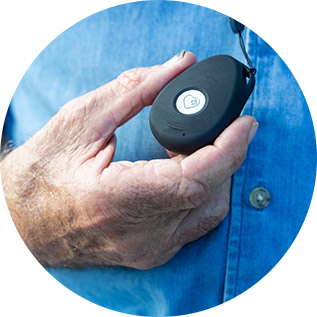 Elderly Australian man wearing an emergency alarm pendant