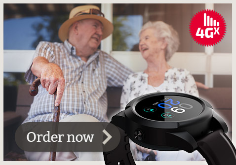 Elderly Australian couple wearing LiveLife 4GX mobile watch and looking at each other.