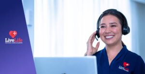 LiveLife Alarms staff wearing a headset and smiling